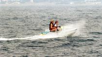 <p>Princess Diana speeds along the water with her 12-year-old son, Prince Harry, on a jet ski while on vacation in Saint-Tropez.</p>