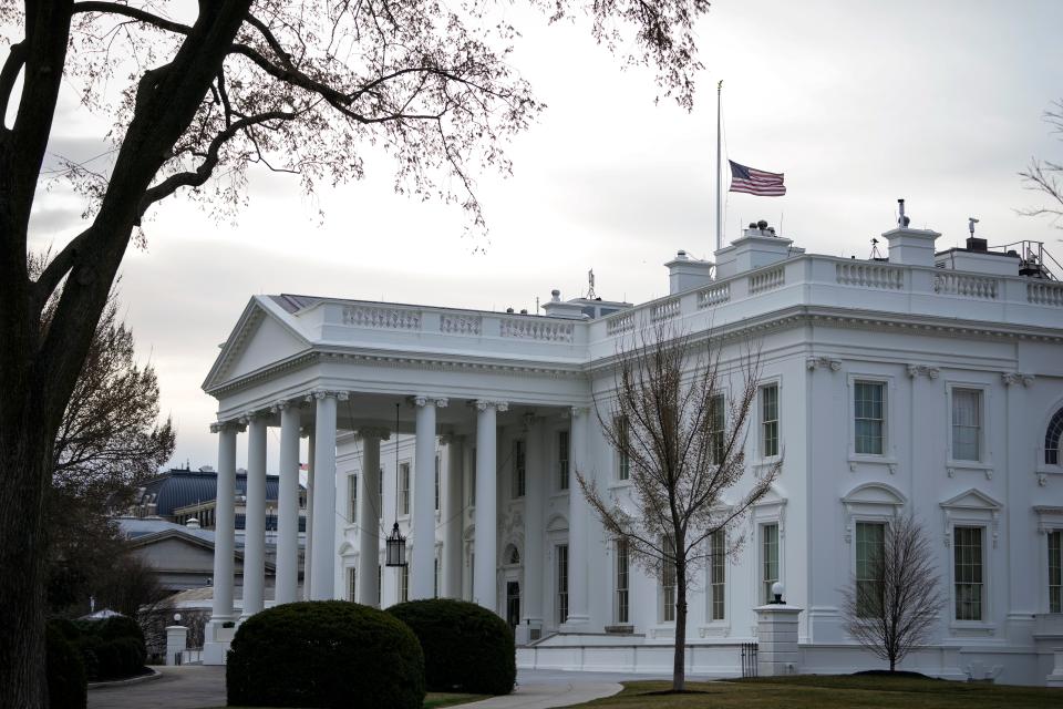 The American flag flies at half-staff at the White House on March 19, 2021 in Washington, DC.