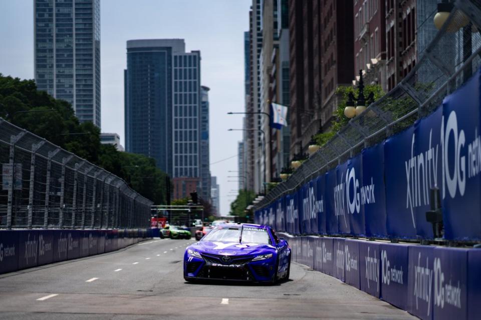 Denny Hamlin leads a group of cars at the Chicago Street Course