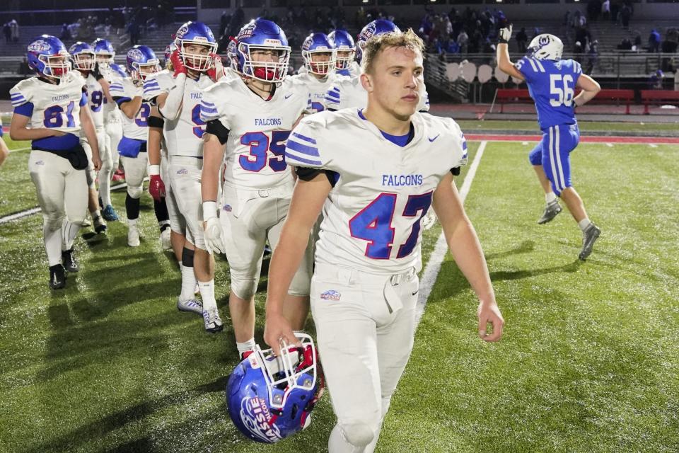 Clinton-Massie's Brodie Green (47) walks off the field following his team's 40-7 defeat against Wyoming during an OHSAA Division IV high school football regional semifinal at Lakota West High School, Saturday, Nov. 12, 2022.