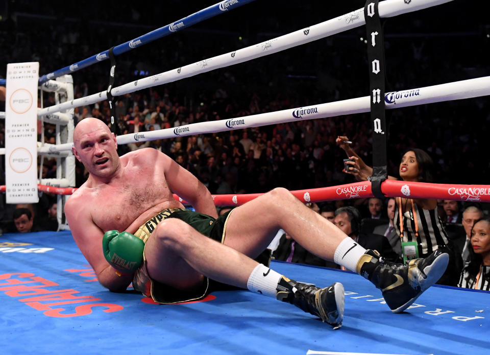 Tyson Fury somehow gets up during the WBC Heavyweight Champioinship at Staples Center. Pic: Getty