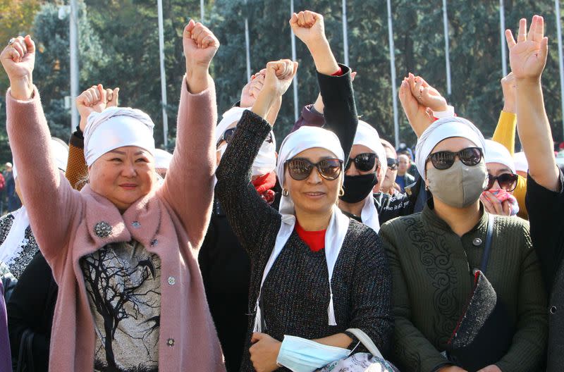 People attend a rally to demand the resignation of Kyrgyzstan's President Sooronbai Jeenbekov in Biskek