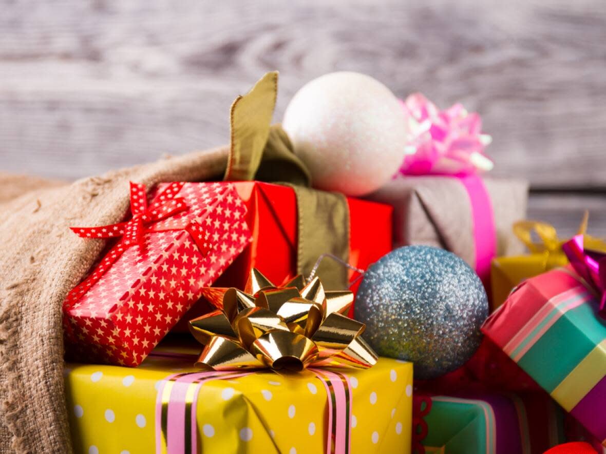 Members of the public have been donating personalized gifts to total strangers through the Regina Christmas Wish List program since 2008. (Shutterstock/margostock - image credit)