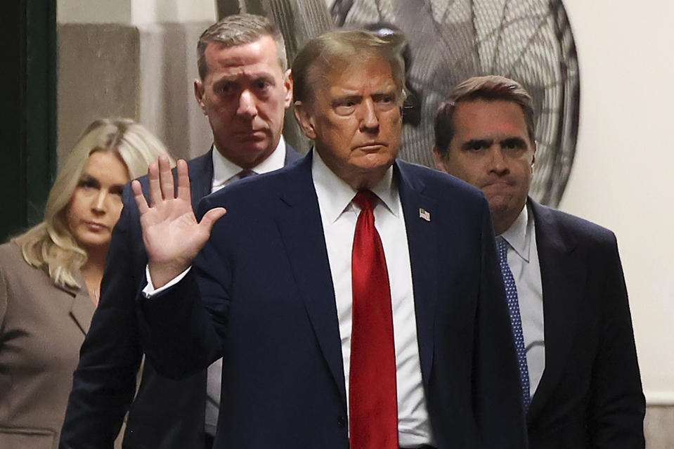 Former president Donald Trump returns to the courtroom after a recess in Manhattan criminal court, Tuesday, April 23, 2024, in New York. Trump is accused of falsifying internal business records as part of an alleged scheme to bury stories he thought might hurt his presidential campaign in 2016. (AP Photo/Yuki Iwamura, Pool)