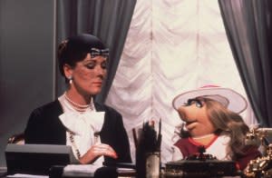 Diana Rigg and Miss Piggy in <em>The Great Muppet Caper</em>