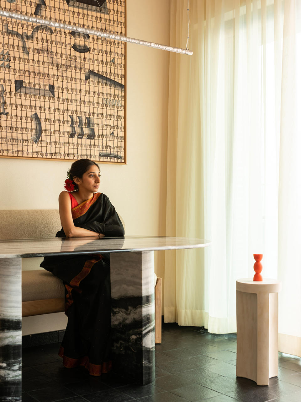 woman sitting at the dining table