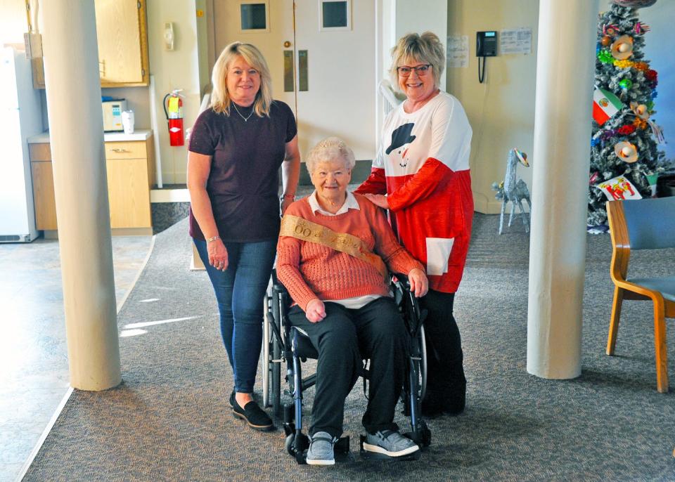 Wayne County Care Center resident Peg Persinger celebrated her 100th birthday recently with her daughters Lynda Geitgey (left) and Sue Boss (right).