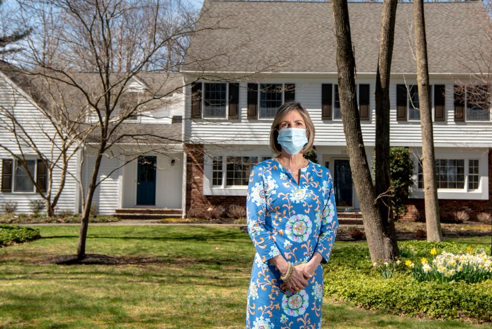 Realtor Ann Marie Battaglia stands in front of a Basking Ridge home on Tuesday April 6, 2021. Battaglia recently sold the home for over a million dollars. 