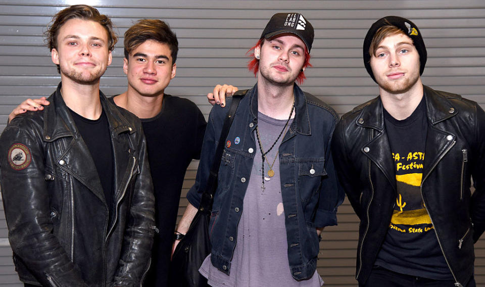 5 Seconds of Summer standing together