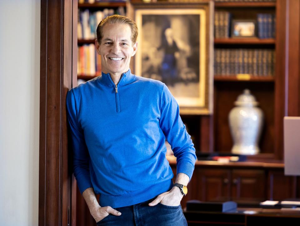 Martin Frey poses in his office for a photo as he talks about his experiences of climbing the Seven Summits and sailing the Seven Seas during an interview at his Holladay home on Tuesday, March 28, 2023. Frey now does motivational speaking to professionals and young people groups. | Scott G Winterton, Deseret News