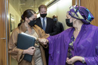 In this photo provided by the United Nations, U.S. Deputy Secretary-General Amina Mohammed, right, Meghan Markle, left, and Prince Harry meet during a visit to U.N. headquarters during the the 76th session of the United Nations General Assembly on Saturday, Sept. 25, 2021. (Manuel Elías/U.N. via AP)