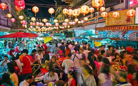 Crowds in Bangkok - Credit: Martin Puddy