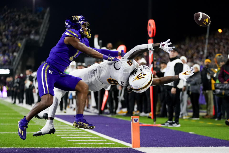 Washington cornerback Jabbar Muhammad (1) breaks up a pass in the end zone to Arizona State wide receiver Troy Omeire (9) during the second half of an NCAA college football game Saturday, Oct. 21, 2023, in Seattle. Washington won 15-7. (AP Photo/Lindsey Wasson)