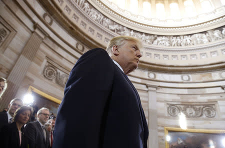 U.S. President Donald Trump arrives for ceremonies in the U.S. Capitol Rotunda as the remains of the late Rev. Billy Graham lie in honor in Washington, U.S. February 28, 2018. REUTERS/Jonathan Ernst