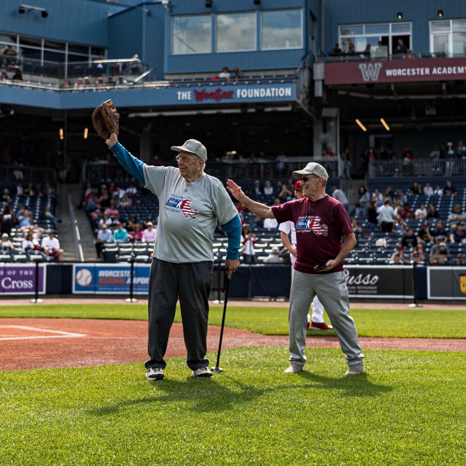 Donald Holcomb, of Chicopee, waves to the crowd at Polar Park on June 10 after the 87-year-old and member of the Western Mass Relics Senior Softball League caught a ceremonial first pitch.