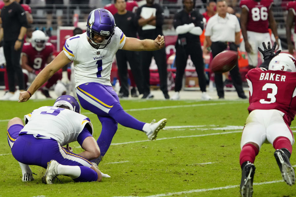 Minnesota Vikings kicker Greg Joseph (1) attempts a game-winning field goal as punter Jordan Berry (3) holds during the second half of an NFL football game, Sunday, Sept. 19, 2021, in Glendale, Ariz. Joseph missed and the Cardinals won 34-33. (AP Photo/Rick Scuteri)