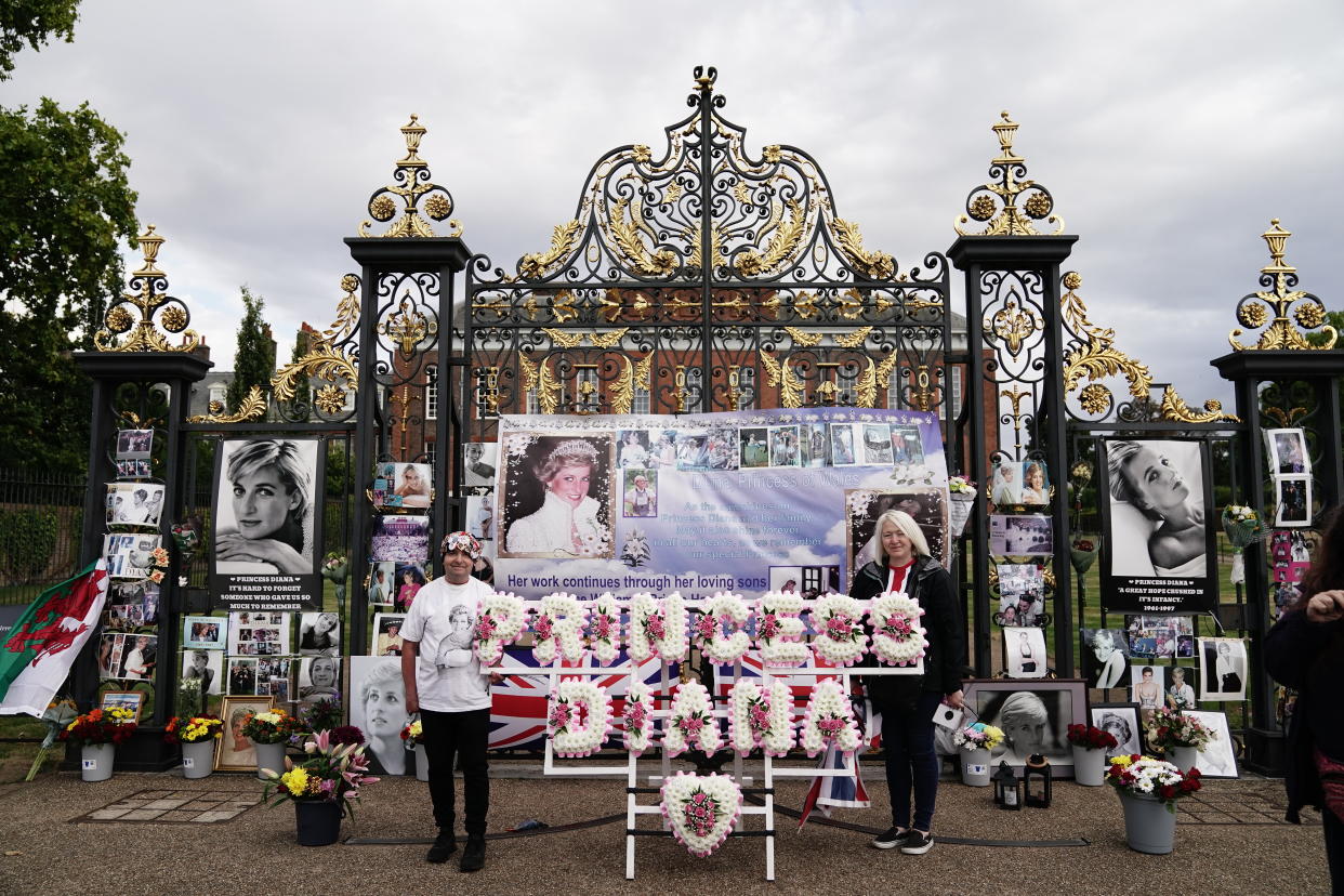 Flowers are placed at the gates outside Kensington Palace, London, the former home of Diana, Princess of Wales, on the 25th anniversary of her death. Picture date: Wednesday August 31, 2022.