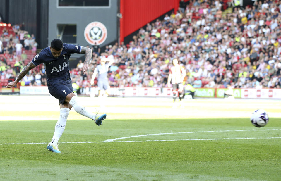 Tottenham Hotspur's Pedro Porro scores their side's second goal of the game during the Premier League match between Sheffield and Tottenham Hotspur at Bramall Lane, Sheffield., Sunday May 19, 2024. (Barrington Coombs/PA via AP)
