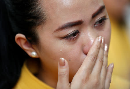 A flight steward of Jet Airways weeps during a protest demanding to "save Jet Airways" in New Delhi, India, April 18, 2019. REUTERS/Adnan Abidi