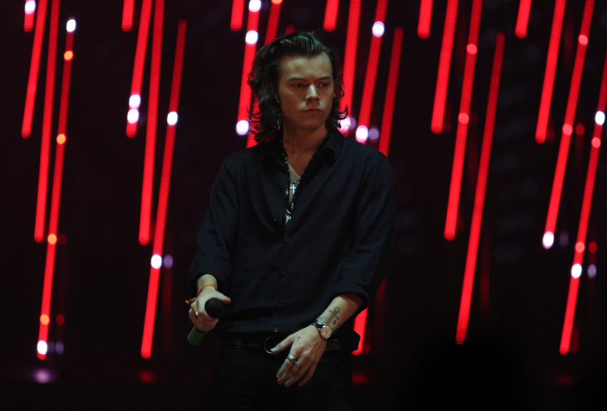 Harry Styles stuns in a black T-shirt with pant to match