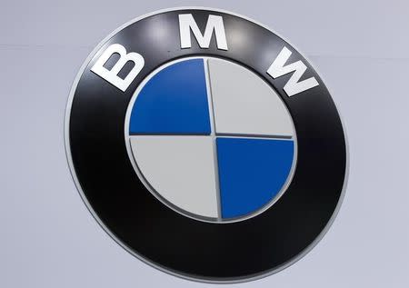 A BMW logo is pictured at the Jacob Javits Convention Center during the New York International Auto Show in New York April 16, 2014. REUTERS/Carlo Allegri