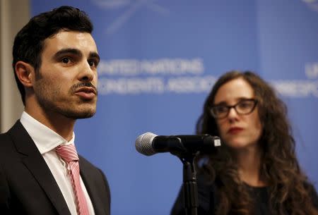 Gay Syrian refugee Subhi Nahas (L) speaks as Jessica Stern, Executive Director of the International Gay & Lesbian Human Rights Commission (R) looks on, at a news conference at the United Nations headquarters in New York, August 24, 2015. REUTERS/Mike Segar