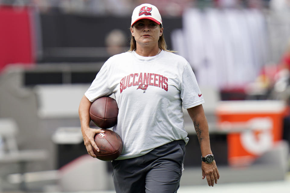 FILE - Tampa Bay Buccaneers assistant defensive line coach Lori Locust watches before an NFL football game against the Green Bay Packers on Sept. 25, 2022, in Tampa, Fla. The Tennessee Titans hired locust as defensive quality control coach. (AP Photo/Chris O'Meara, File)