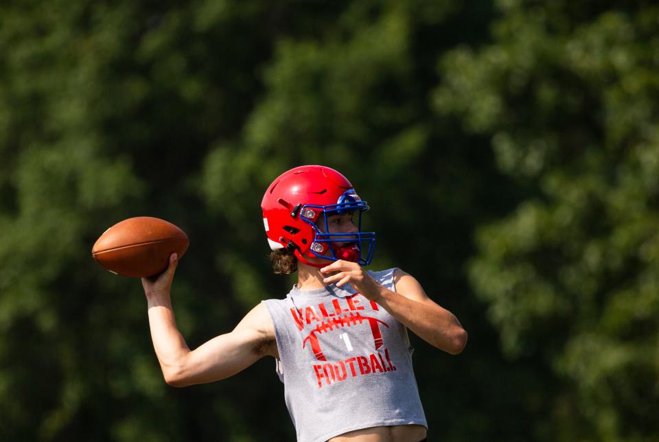 Licking Valley quarterback Hayden Rodgers throws the ball to a receiver during a 7-on-7 scrimmage last month at Columbus Academy.