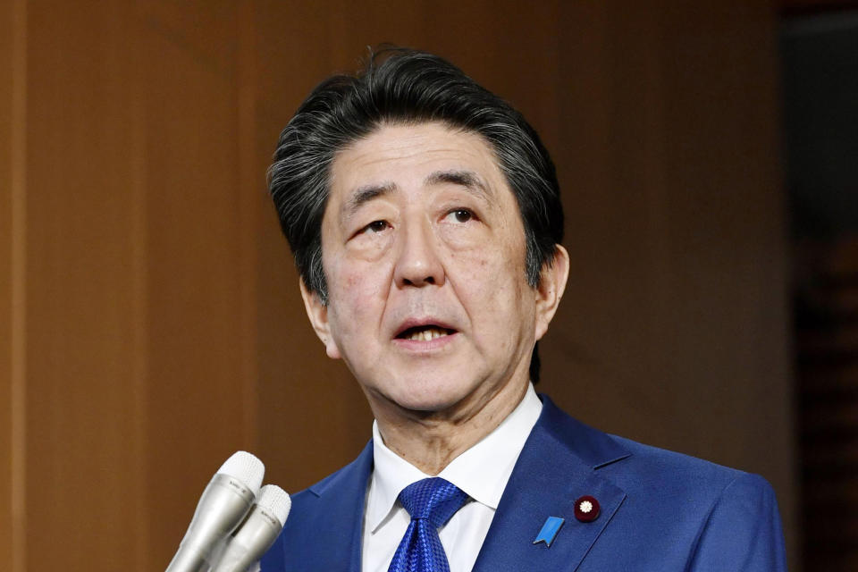 Japan's Prime Minister Shinzo Abe speaks to media about the projectiles that North Korea launched Thursday, Nov. 28, 2019, in Tokyo. (Kyodo News via AP)