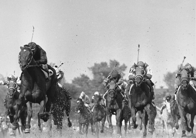 Jockey Gustavo Avilla rides Cañonero II, front left, to victory at the 1971 Kentucky Derby.