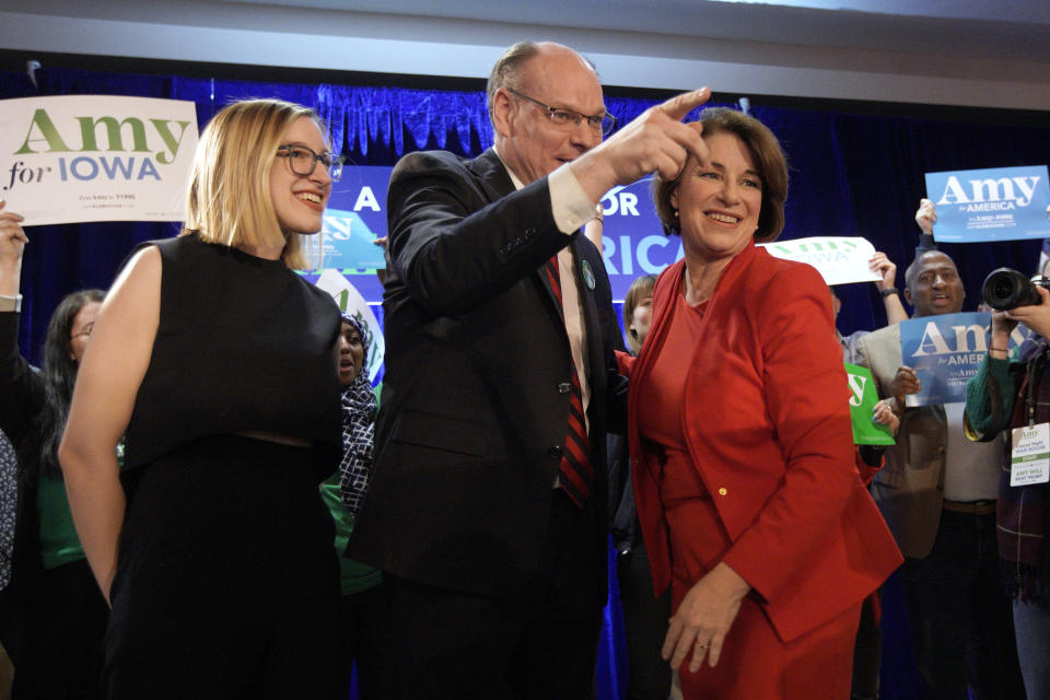 Sen. Amy Klobuchar, D-Minn., stands with her husband, John Bessler, and daughter Abigail Klobuchar Bessler, left, in February. (Photo: ASSOCIATED PRESS)