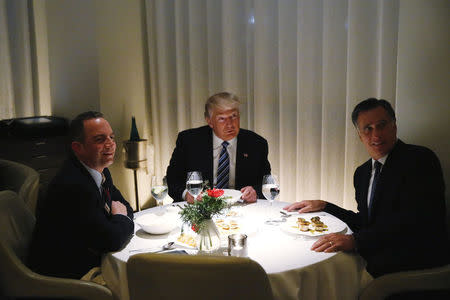 U.S. President-elect Donald Trump sits at a table for dinner with former Massachusetts Governor Mitt Romney (R) and his choice for White House Chief of Staff Reince Priebus (L) at Jean-Georges at the Trump International Hotel & Tower in New York, U.S., November 29, 2016. REUTERS/Lucas Jackson