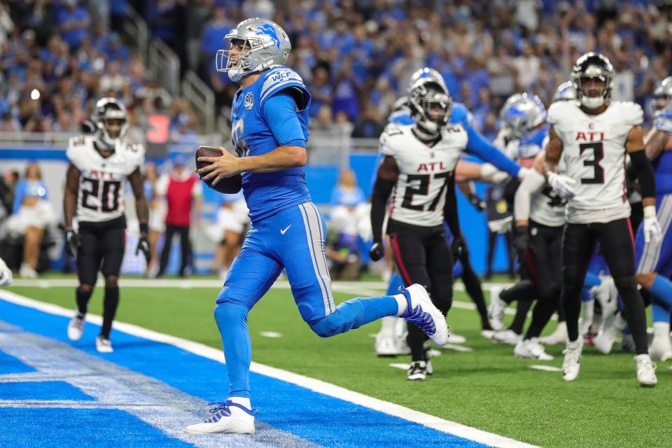 Detroit Lions quarterback Jared Goff (16) runs for a touchdown against Atlanta Falcons during the second half at Ford Field in Detroit on Sunday, Sept. 24, 2023.