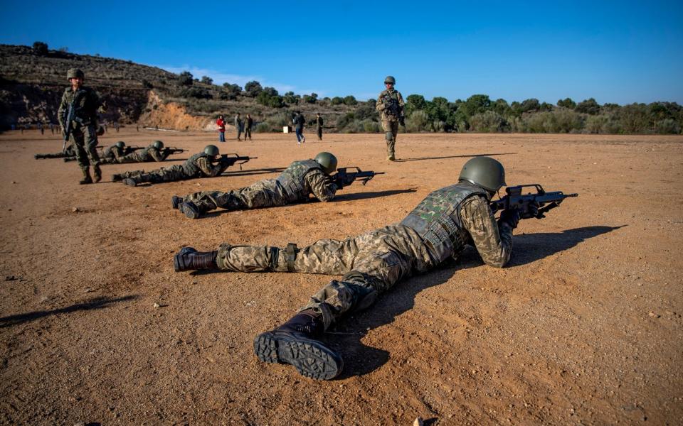 Ukrainian military personnel undergo military instruction with Spanish soldiers from the Infantry Academy of Toledo - Ismael Herrero/EPA-EFE/Shutterstock/Shutterstock