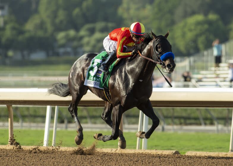 In a photo provided by Benoit Photo, Cave Rock and jockey Juan Hernandez win.