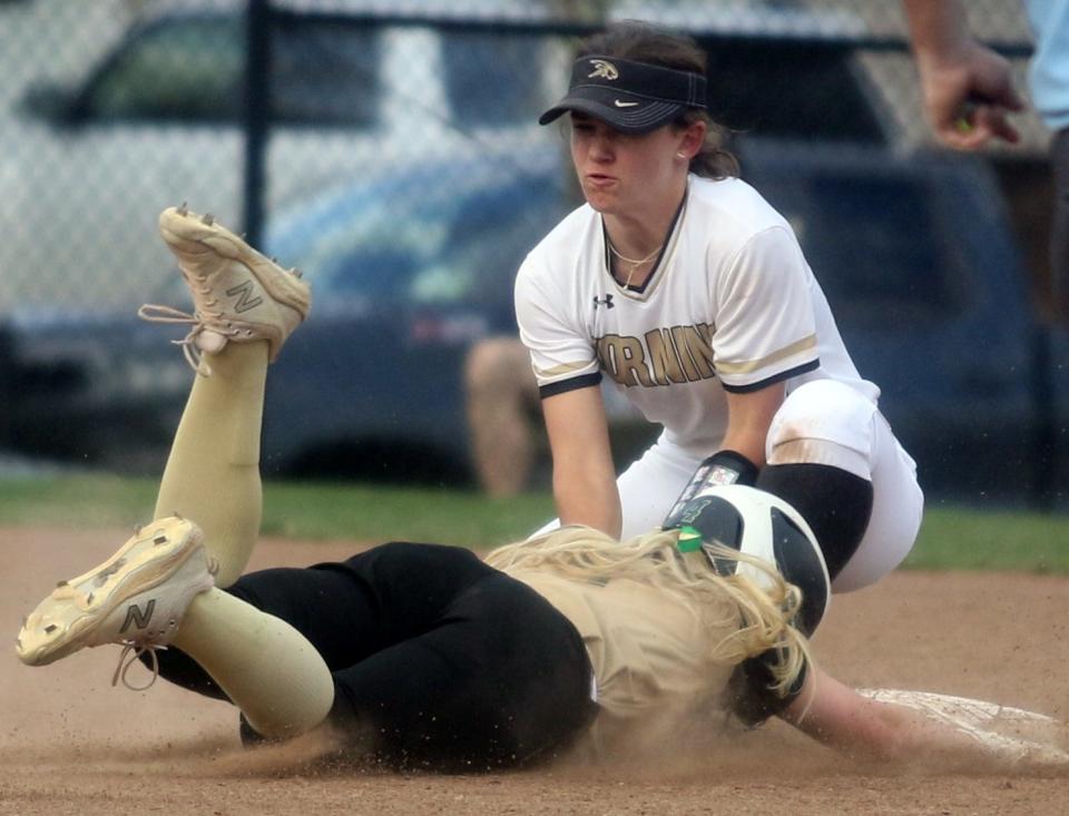 Corning shortstop Kendall Curreri tags out Vestal's Edna Kiefer at second base during the Golden Bears' 9-5 win last season.