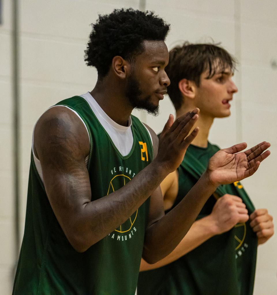 Shamir Bogues claps during a UVM men's basketball summer practice at Patrick Gym.