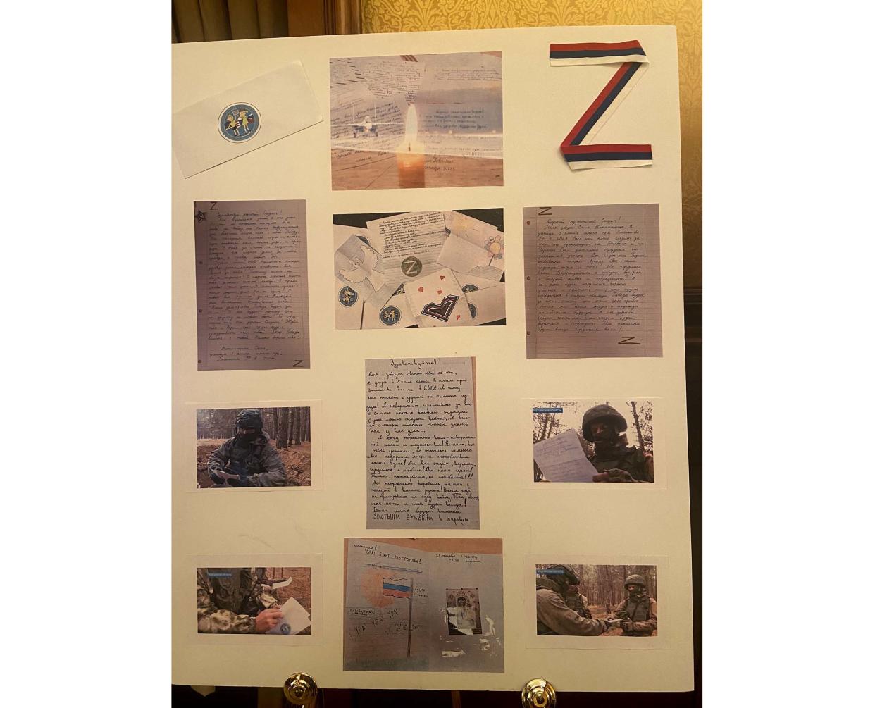 A display at the Russian Embassy party of letters from Russian children to soldiers at the front, together with a large Z.