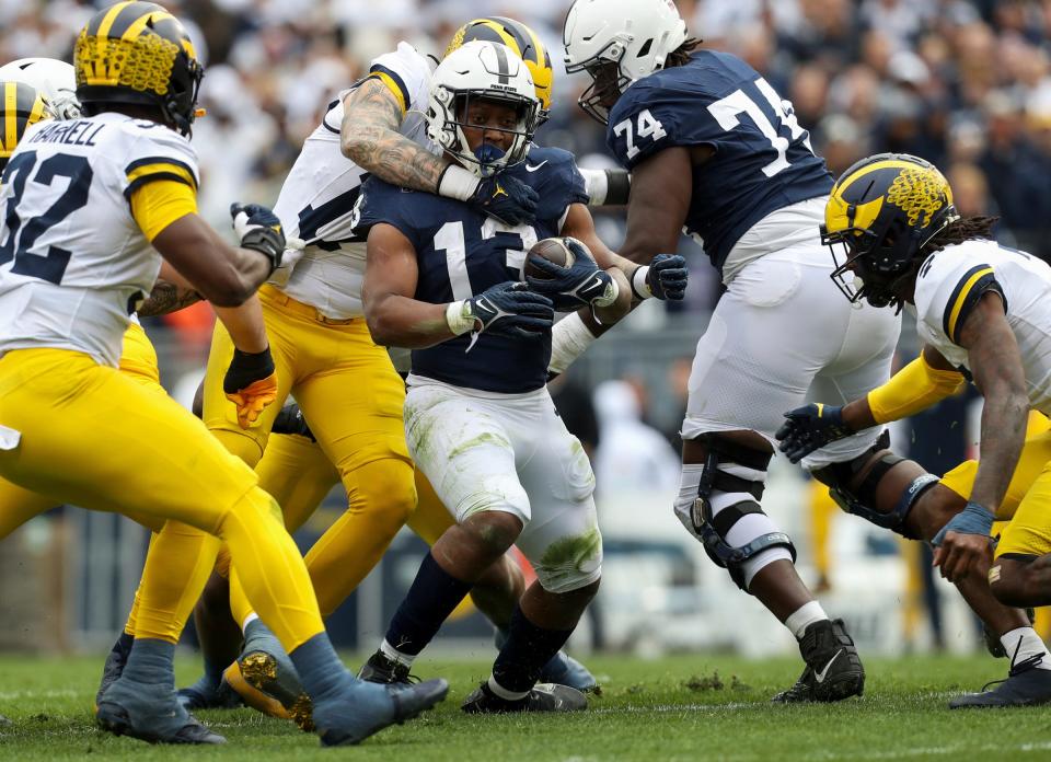 Penn State Nittany Lions running back Kaytron Allen runs the ball against the Michigan Wolverines during the second quarter on Nov. 11, 2023 in State College, Pennsylvania.