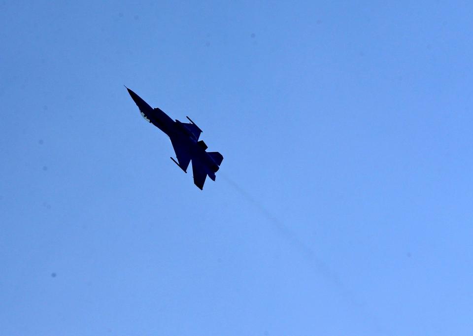 Air Force F-16 Viper Demo Team safety observer Capt. Christopher Danieli takes a turn before landing at Pease Air National Guard Base in Portsmouth Wednesday, Sept. 6, 2023, ahead of this weekend's Thunder Over New Hampshire Air Show.