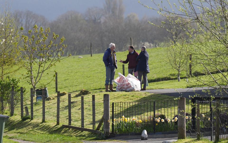 Police investigating the murder make enquiries in Aberfeldy