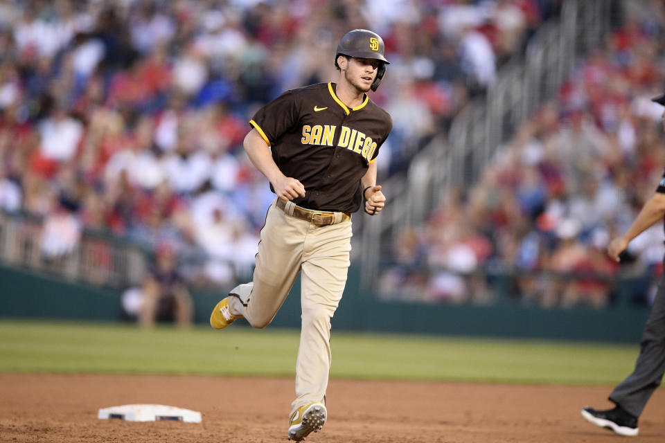 San Diego Padres' Wil Myers rounds the bases on his grand slam during the second inning of a baseball game against the Washington Nationals, Friday, July 16, 2021, in Washington. (AP Photo/Nick Wass)