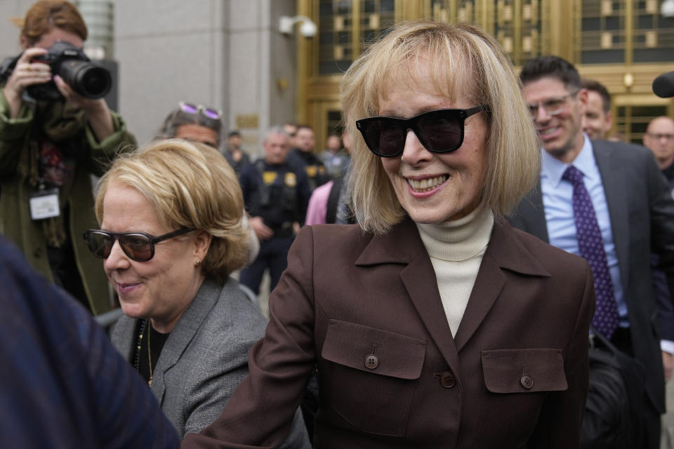 FILE — E. Jean Carroll, right, walks out of Manhattan federal court, May 9, 2023, in New York. Four months after a jury found that Donald Trump sexually abused and defamed advice columnist E. Jean Carroll, a federal judge ruled Wednesday, Sept. 6, 2023, that still more of the ex-president's comments about her were libelous. The decision means that an upcoming second civil trial will concern only how much more he has to pay Carroll. (AP Photo/Seth Wenig, File)