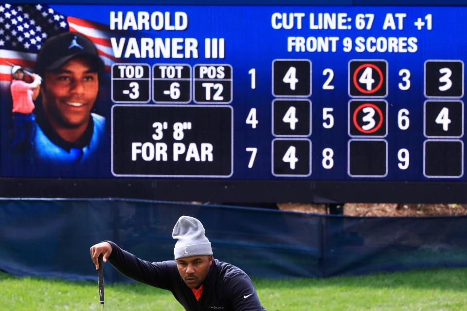 Harold Varner III looks over his putt at the eighth hole of the Players Stadium Course on Sunday.