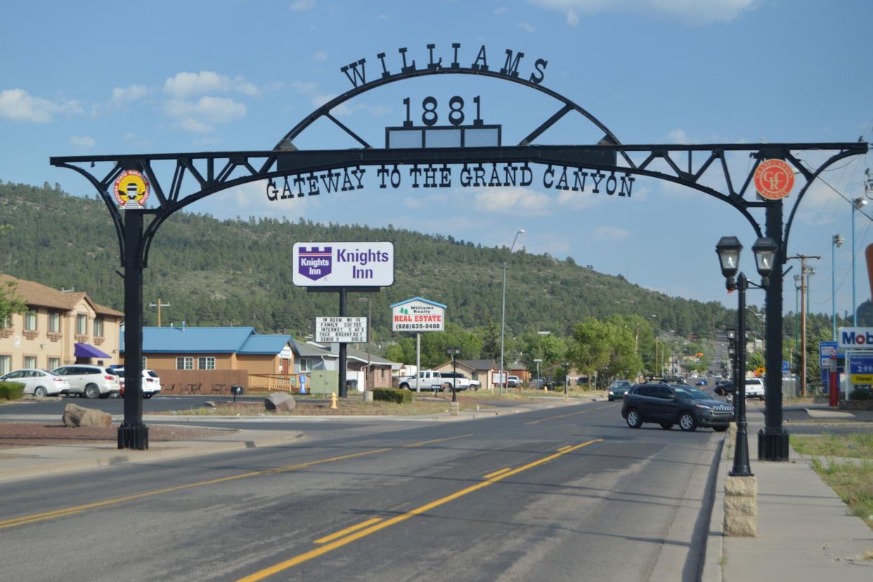 gateway to the grand canyon arch over route 66 in williams