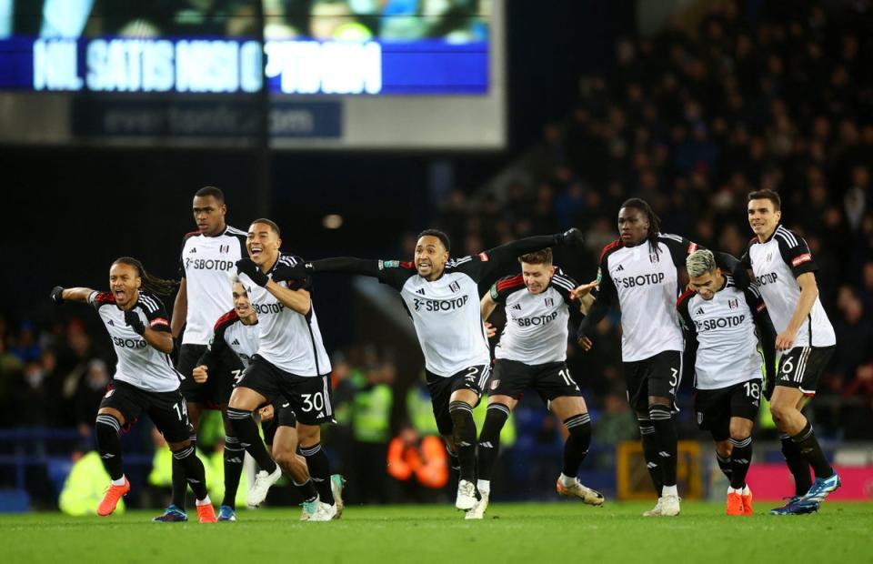 Fulham celebrate at the final whistle (REUTERS)