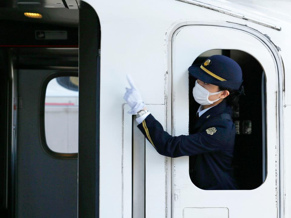 A shinkansen bullet train conductor