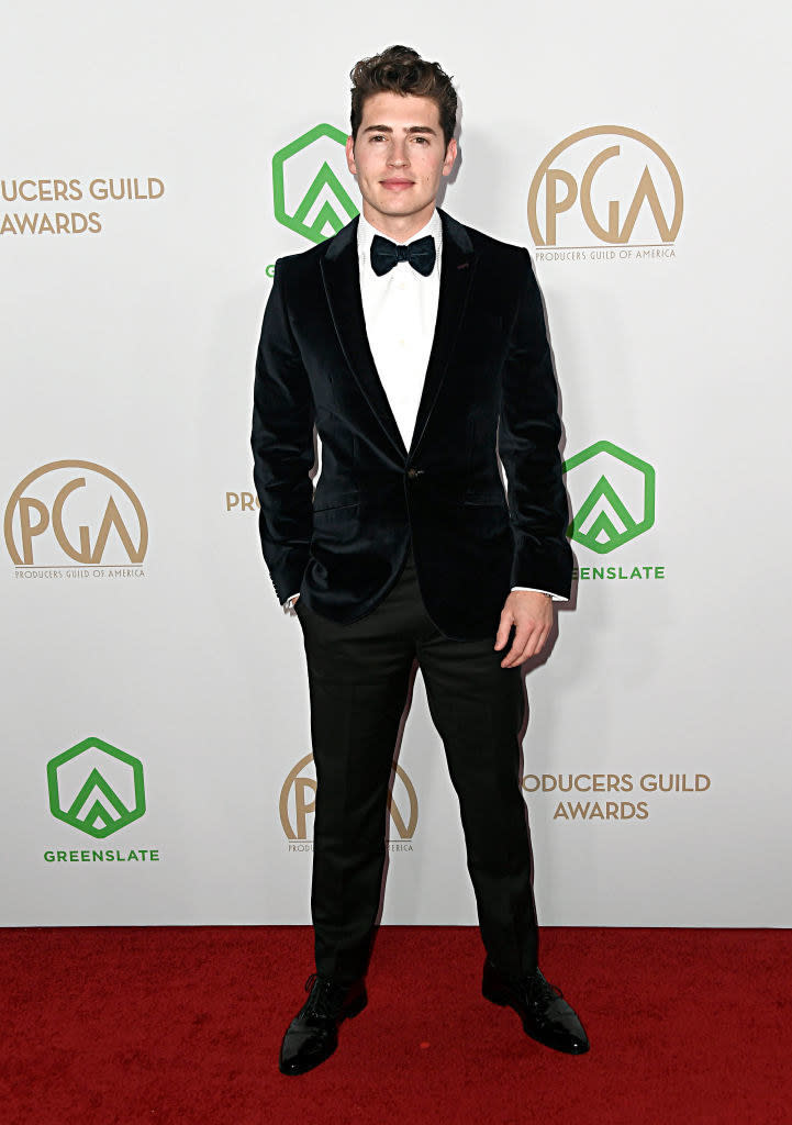 Gregg Sulkin in a tuxedo at the Producers Guild Awards