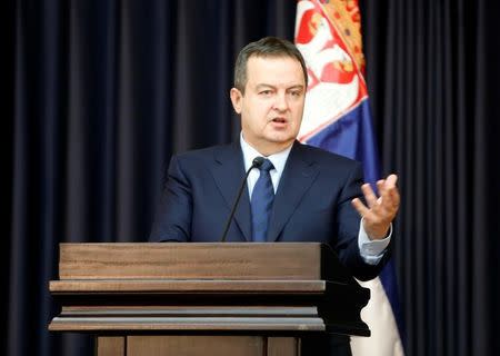 Serbian Foreign Minister Ivica Dacic gestures during a joint news conference with Palestinian Foreign Minister Riyad al-Maliki in the West Bank town of Bethlehem January 6, 2017. REUTERS/Mussa Qawasma/Files