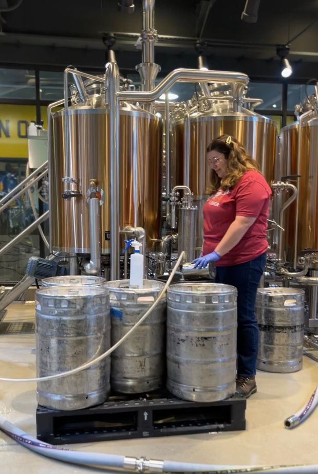 Corrine Georges brews beer in J. Leinenkugel's Barrel Yard at American Family Field. Georges is the pilot brewery's first and only brewer on-site.